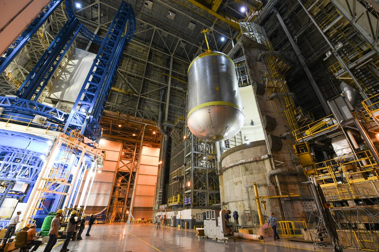 This image shows the latest progress NASA has made in manufacturing the liquid oxygen tank for the second core stage of NASA’s Space Launch System (SLS) rocket. The liquid oxygen tank will be used for the first crewed mission, Artemis II, of the agency’s Artemis program. Teams at NASA’s Michoud Assembly Facility in New Orleans recently completed internal cleaning of the liquid oxygen, or LOX, tank at the facility. Following the cleaning, crews prepared the propellant tank for the next phase of phase of assembly in a different area of the factory by moving, or breaking over, the tank from a vertical to horizontal position. The LOX tank is one of five major elements that make up the rocket’s massive 212-foot-tall core stage. The propellant tank holds 196,000 gallons of supercooled liquid oxygen to help fuel four RS-25 engines, and the internal cleaning ensures no contaminants make their way into the complex propulsion and engine systems of the deep space rocket. The stage, which includes a cluster of four RS-25, will produce more than 2 million pounds of thrust to help launch the SLS rocket and astronauts aboard NASA’s Orion spacecraft around the Moon for Artemis II.   NASA is working to land the first woman and the next man on the Moon by 2024. The agency’s SLS rocket offers more payload mass, volume capability and energy to speed missions through deep space and enable NASA’s Artemis lunar program. SLS, along with Orion, the human landing system, and the Gateway in orbit around the Moon are NASA’s backbone for deep space exploration. No other rocket is capable of carrying astronauts in Orion around the Moon in a single mission.